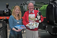 Alan handing over new books